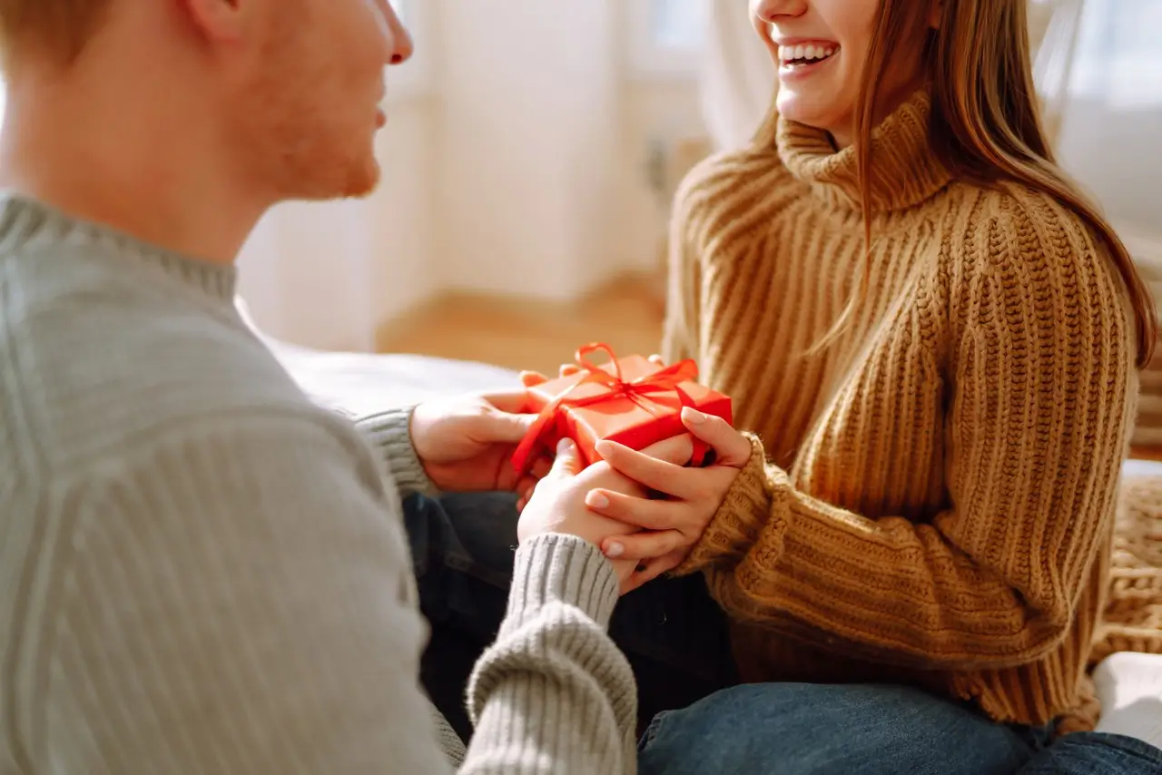 valentine s day concept exchange gifts young couple home celebrating valentine s day Large